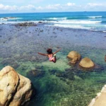 Jumping from rampart, Colonial dutch fort Galle, Sri lanka